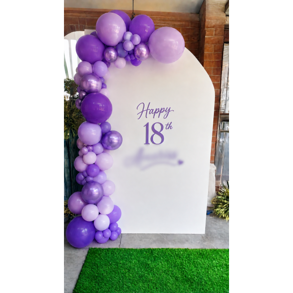 Balloons and decals for half arch backdrop